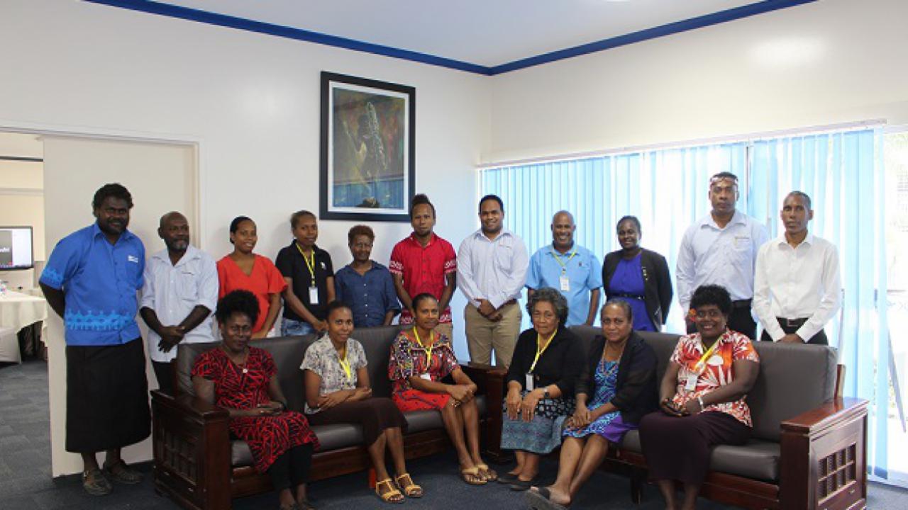 Honiara Base CSO participants pose for a group photo with Parliament staff and Clerk – Mr. David Kusilifu ( center - standing).